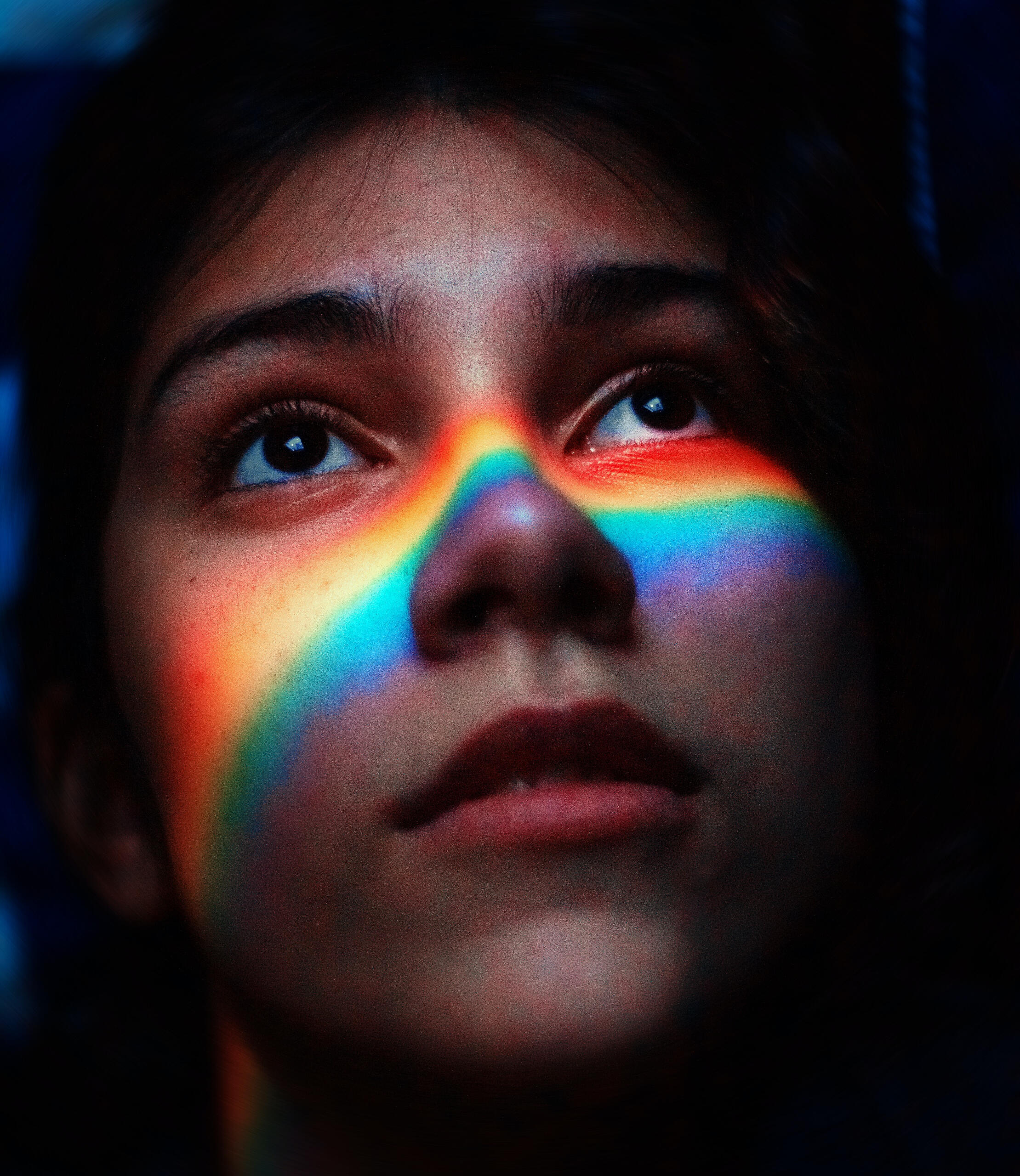 Optimise your visual potential, EyeTherapy Optometry - Photo by Barcelos_fotos: https://www.pexels.com/photo/woman-with-rainbow-light-reflecting-her-face-2859616/